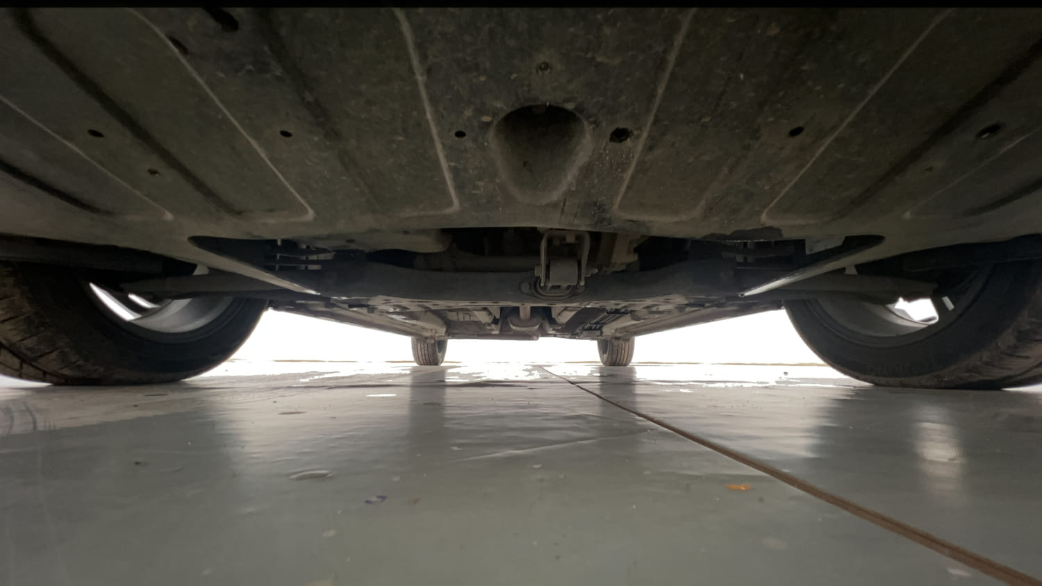 Used 2022 Hyundai New i20 Asta (O) 1.2 MT Petrol Manual extra FRONT LEFT UNDERBODY VIEW
