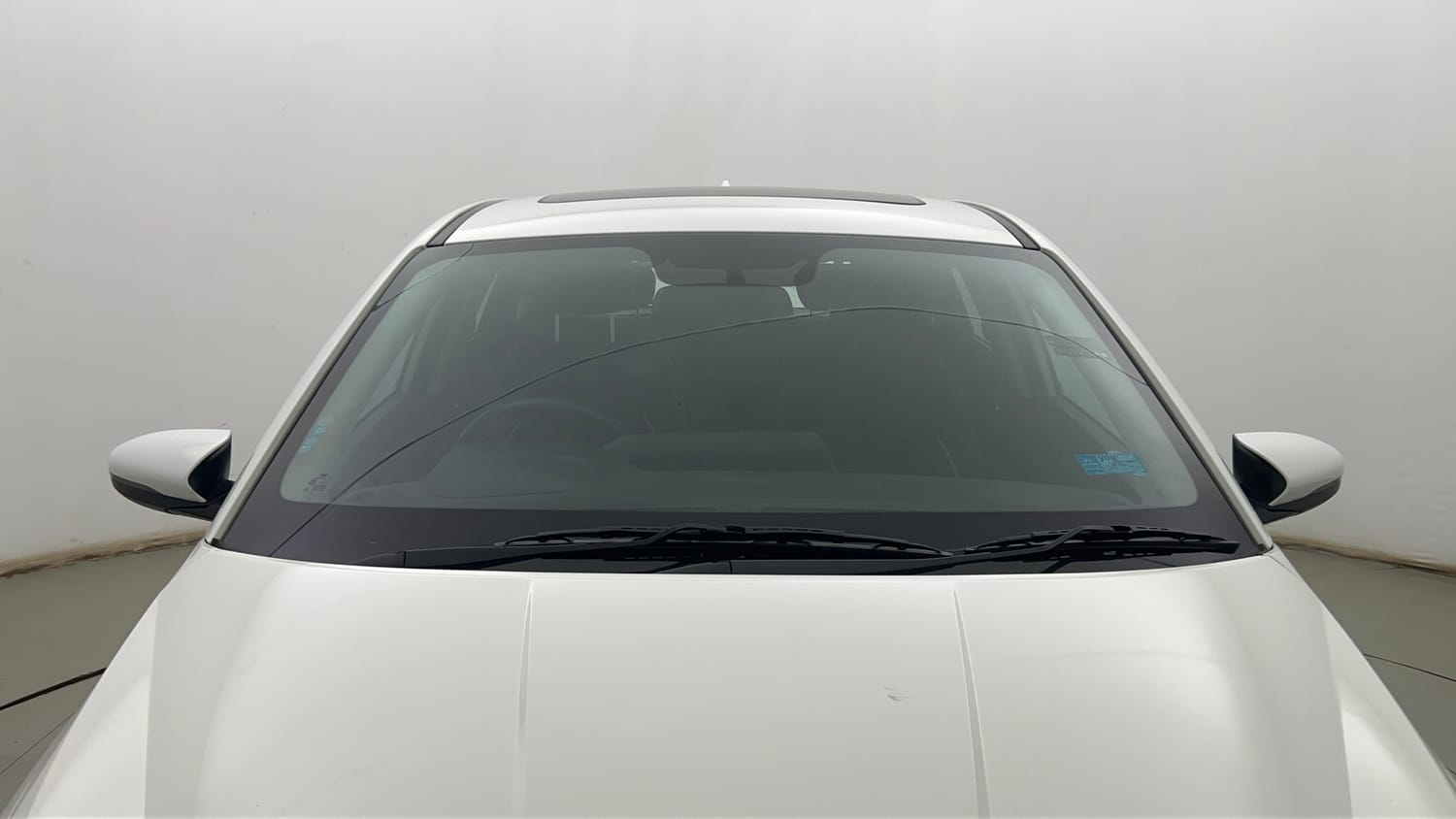 Used 2022 Hyundai New i20 Asta (O) 1.2 MT Petrol Manual exterior FRONT WINDSHIELD VIEW