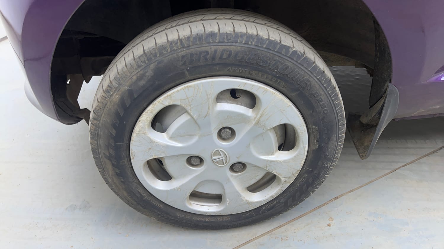 Used 2016 Tata Nano GenX XT Petrol Manual tyres LEFT FRONT TYRE RIM VIEW