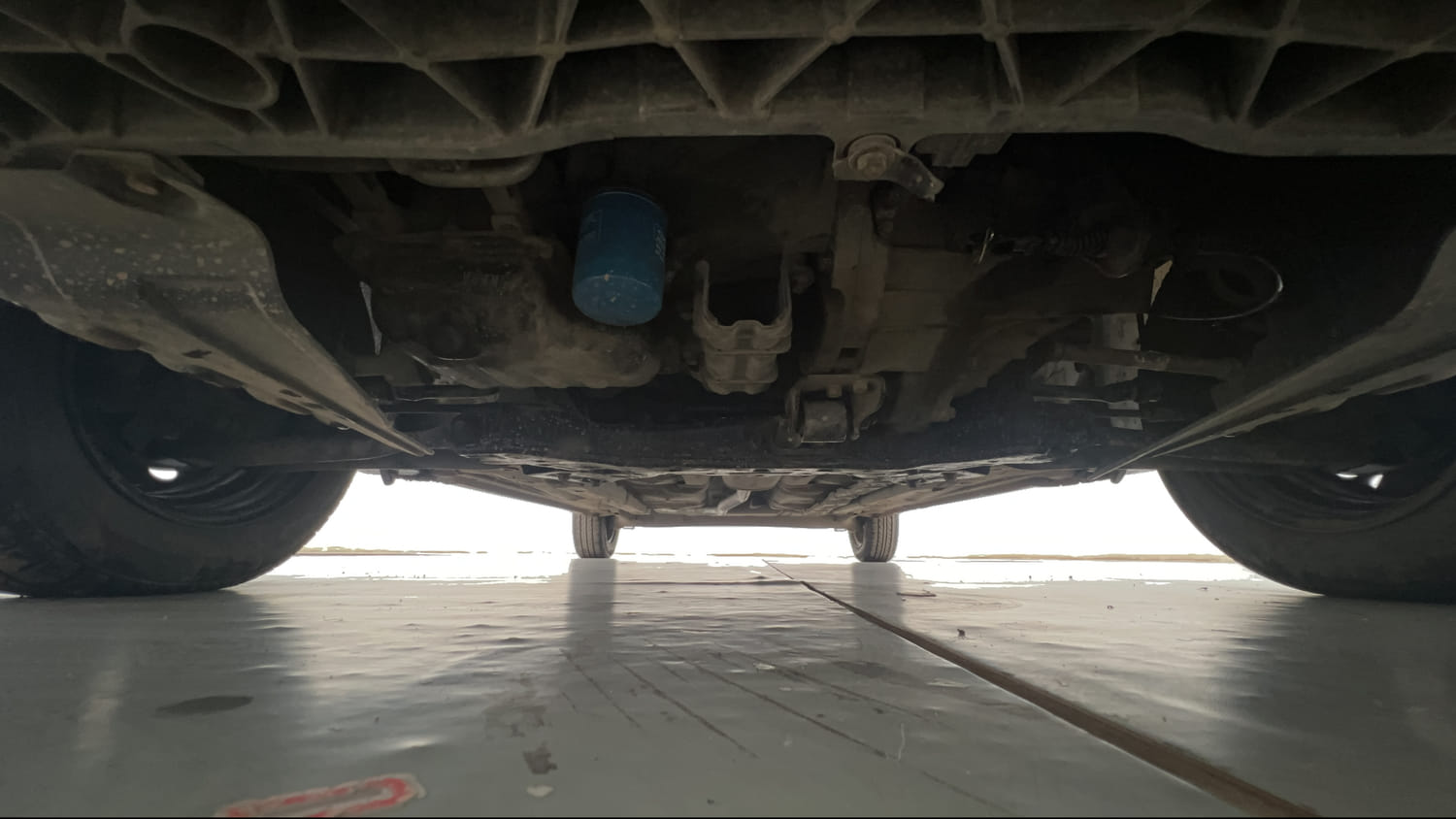 Used 2015 Hyundai Grand i10 Sportz 1.2 Kappa VTVT Petrol Manual extra FRONT LEFT UNDERBODY VIEW