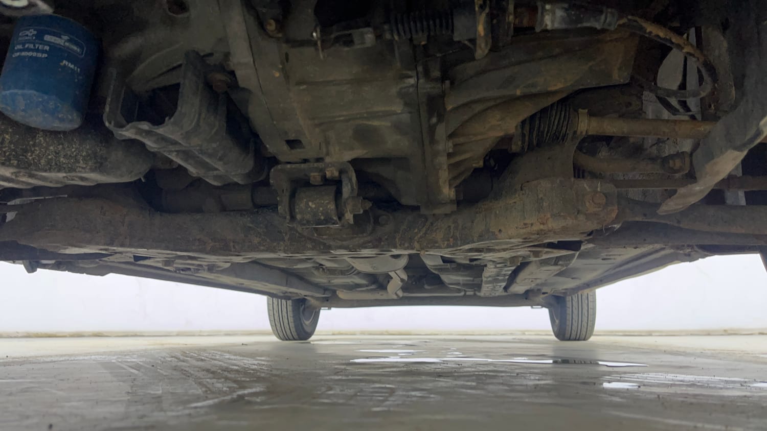 Used 2015 Hyundai Xcent S 1.2 (O) Petrol Manual extra FRONT LEFT UNDERBODY VIEW
