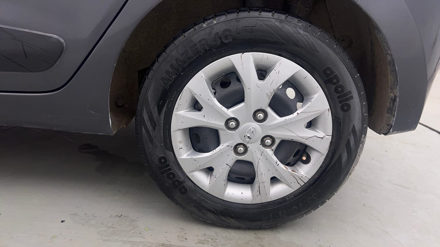 Used 2013 Hyundai Grand i10 Sportz 1.2 Kappa VTVT Petrol Manual tyres LEFT REAR TYRE RIM VIEW