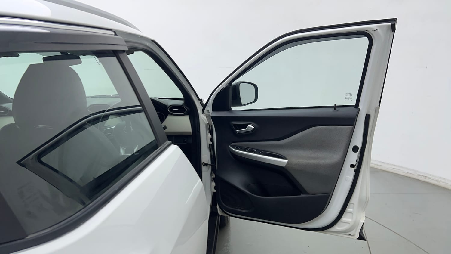 Used 2023 Nissan Magnite XL Petrol Manual interior RIGHT FRONT DOOR OPEN VIEW