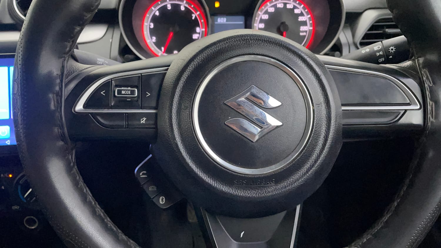 Used 2022 Maruti Suzuki Swift VXi Petrol Manual top_features Steering mounted controls