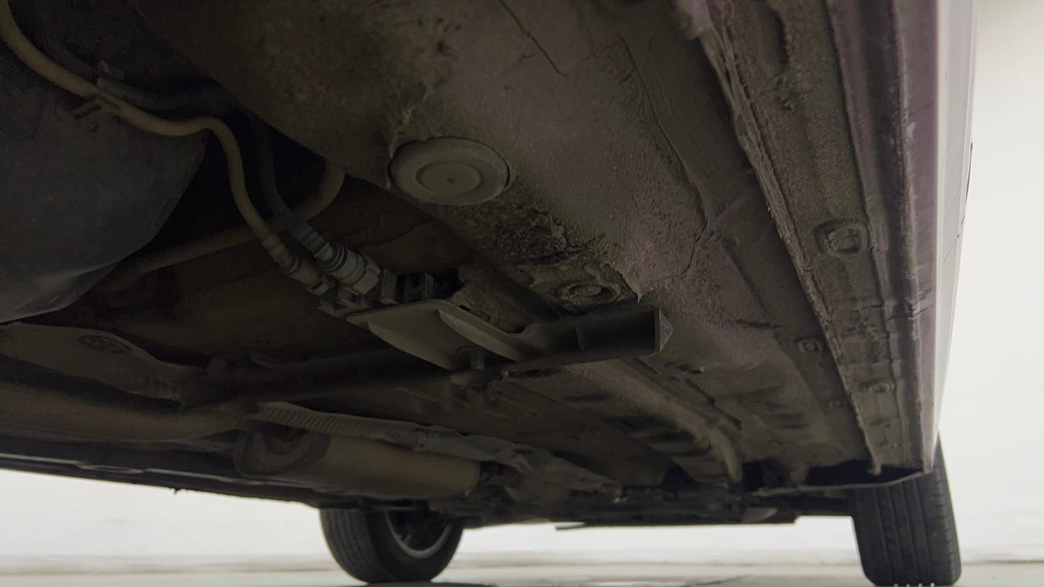 Used 2023 Volkswagen Virtus Highline 1.0 TSI MT Petrol Manual extra REAR RIGHT UNDERBODY VIEW