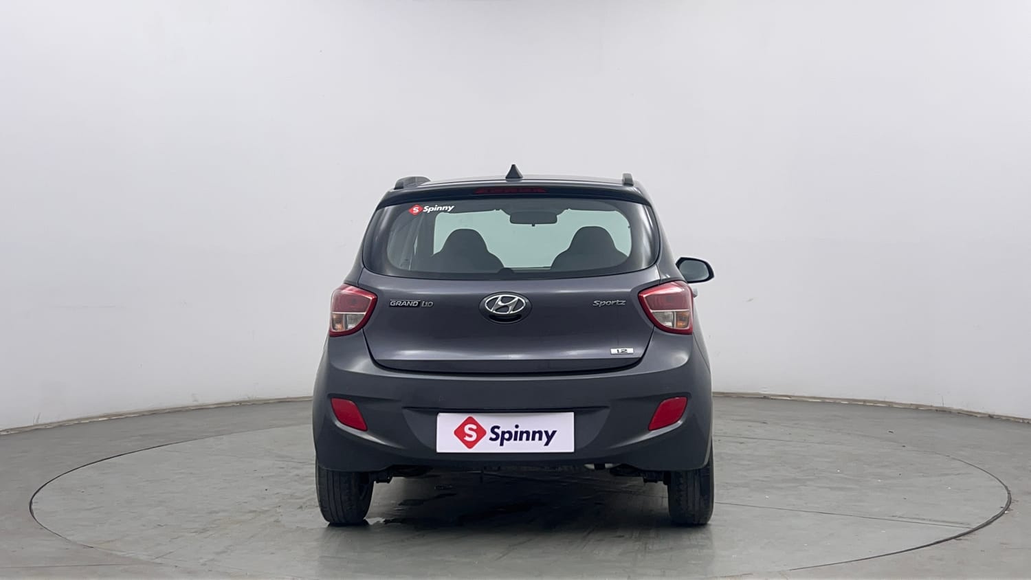Used 2013 Hyundai Grand i10 Sportz 1.2 Kappa VTVT Petrol Manual exterior BACK VIEW