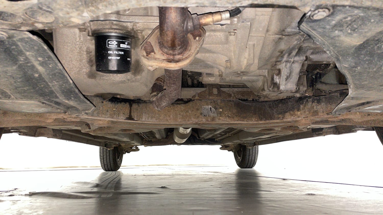 Used 2014 Maruti Suzuki Swift VXi Petrol Manual extra FRONT LEFT UNDERBODY VIEW