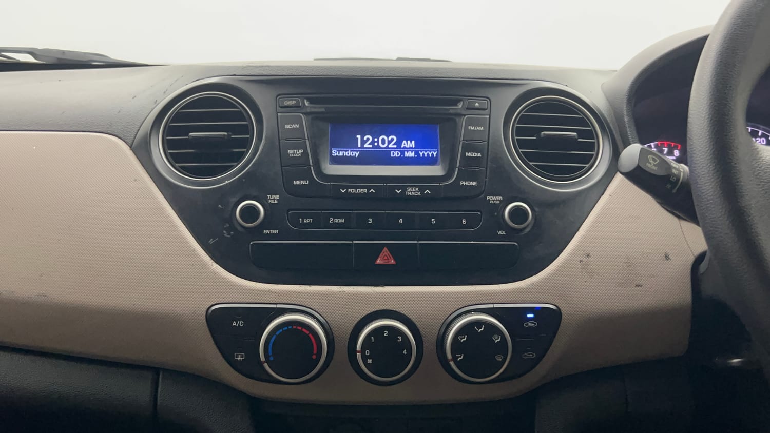 Used 2015 Hyundai Grand i10 Sportz 1.2 Kappa VTVT Petrol Manual interior MUSIC SYSTEM & AC CONTROL VIEW