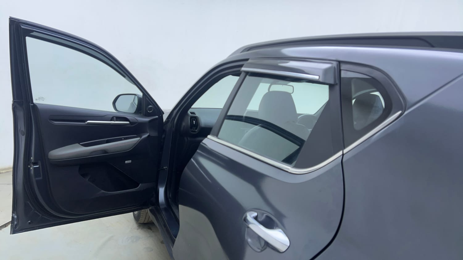 Used 2022 Kia Sonet Anniversary Edition 1.0 DCT Petrol Automatic interior LEFT FRONT DOOR OPEN VIEW