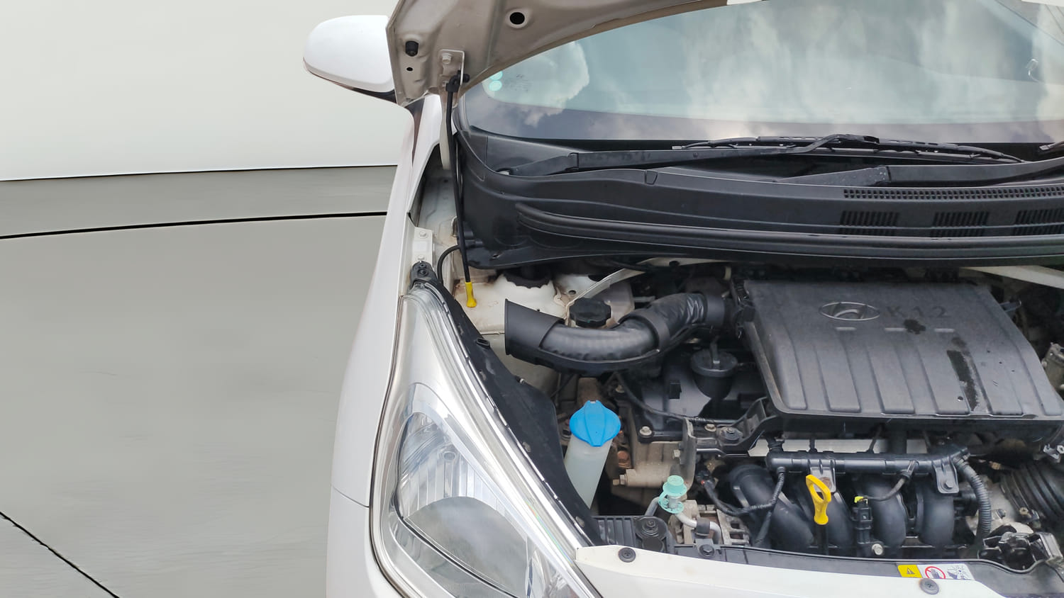 Used 2016 Hyundai Grand i10 Sportz 1.2 Kappa VTVT Petrol Manual engine ENGINE RIGHT SIDE HINGE & APRON VIEW