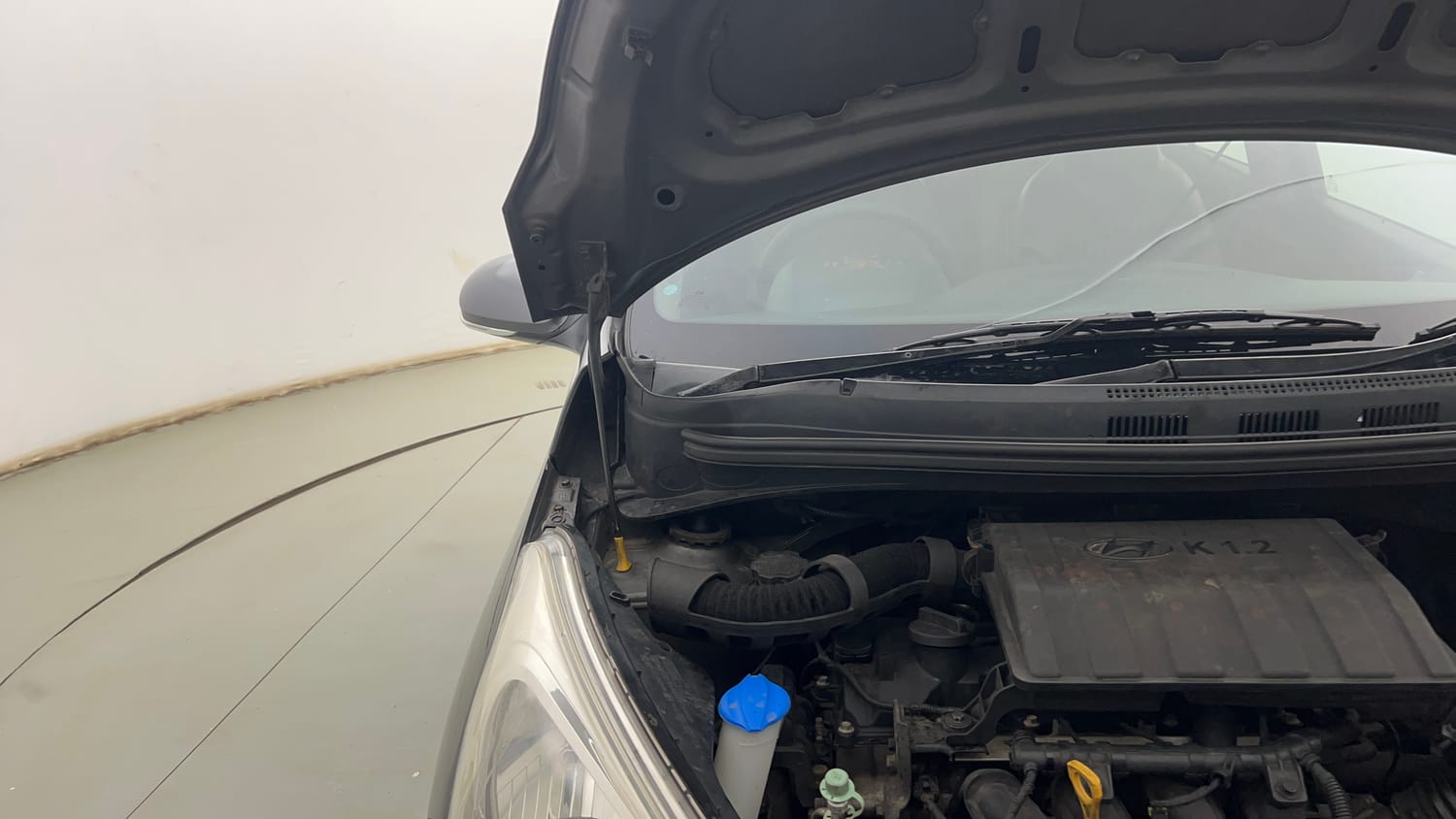 Used 2015 Hyundai Grand i10 Sportz 1.2 Kappa VTVT Petrol Manual engine ENGINE RIGHT SIDE HINGE & APRON VIEW