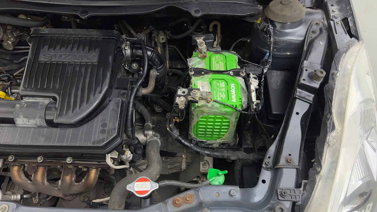 Used 2017 Maruti Suzuki Swift Lxi (O) Petrol Manual engine ENGINE LEFT SIDE VIEW