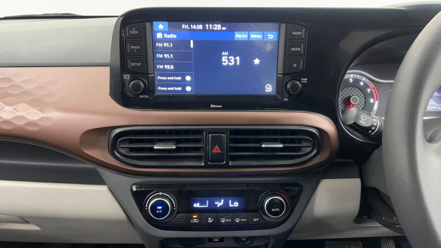 Used 2020 Hyundai Aura SX Plus 1.2 AMT Petrol Petrol Automatic interior MUSIC SYSTEM & AC CONTROL VIEW