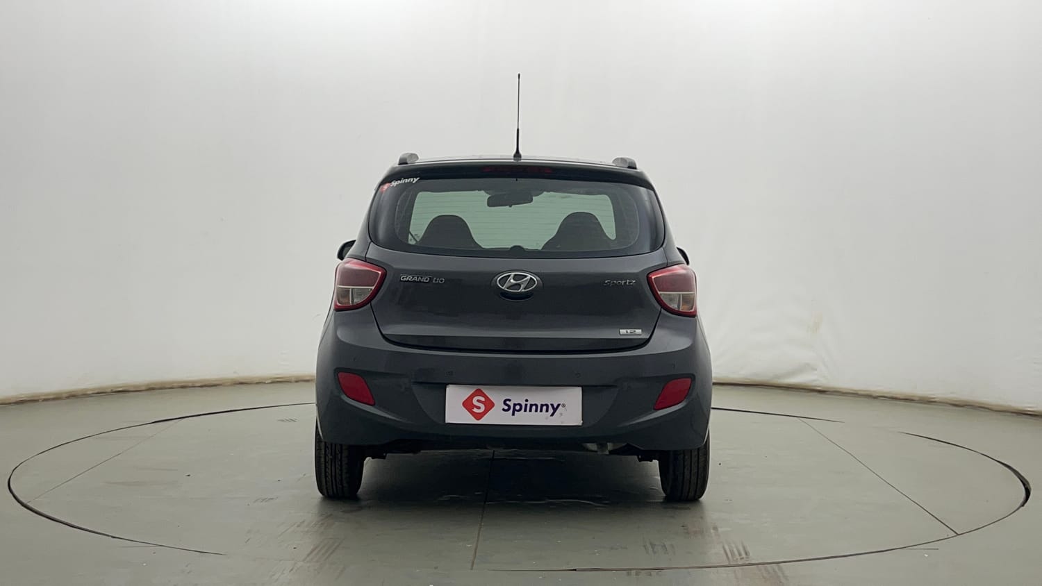 Used 2015 Hyundai Grand i10 Sportz 1.2 Kappa VTVT Petrol Manual exterior BACK VIEW