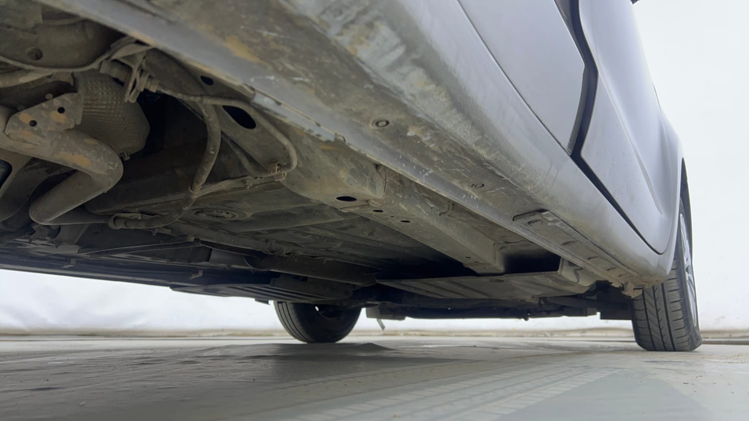 Used 2024 Maruti Suzuki Swift VXi Petrol Manual extra REAR RIGHT UNDERBODY VIEW