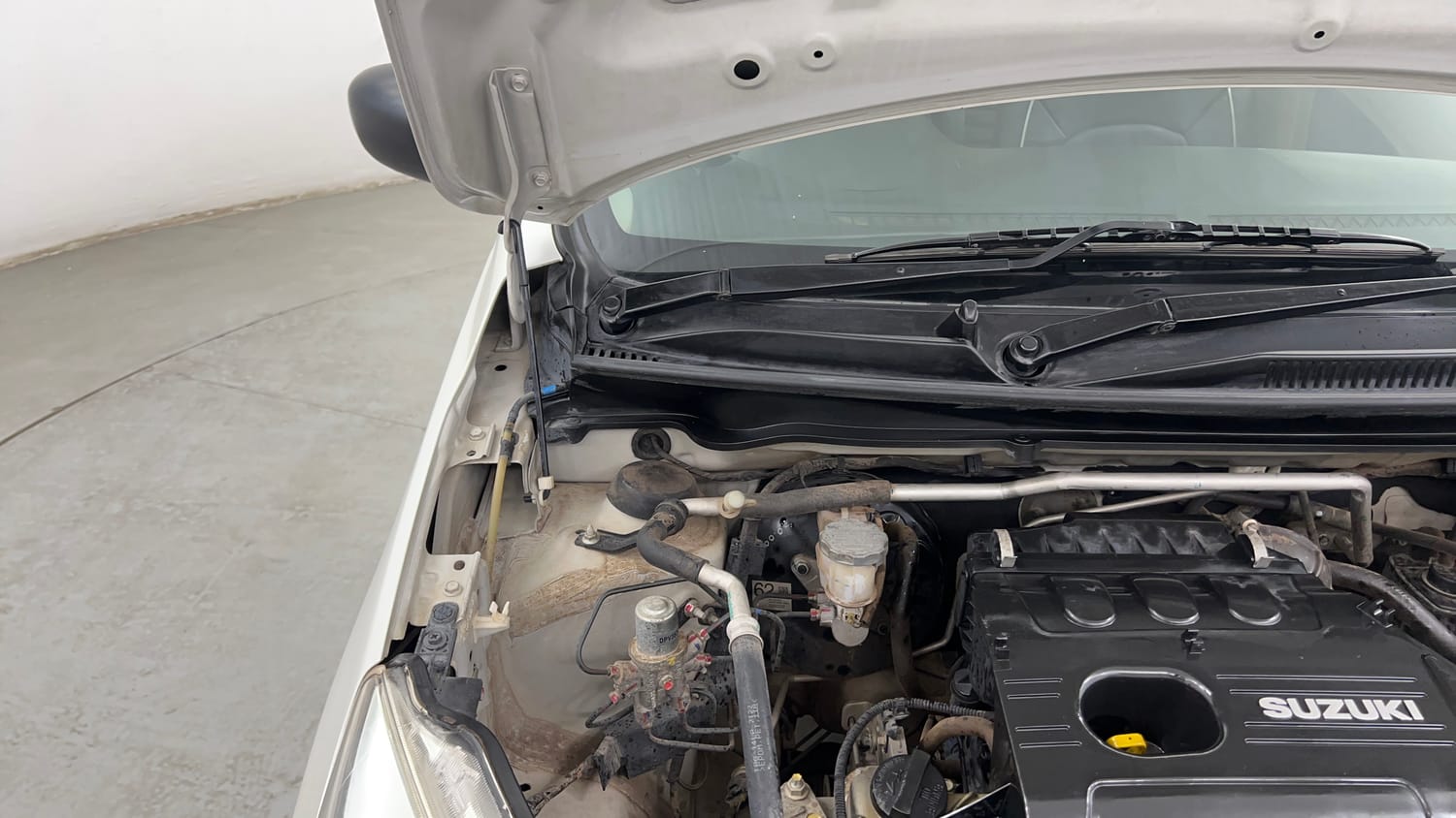 Used 2016 Maruti Suzuki Celerio VXi CNG Cng Manual engine ENGINE RIGHT SIDE HINGE & APRON VIEW