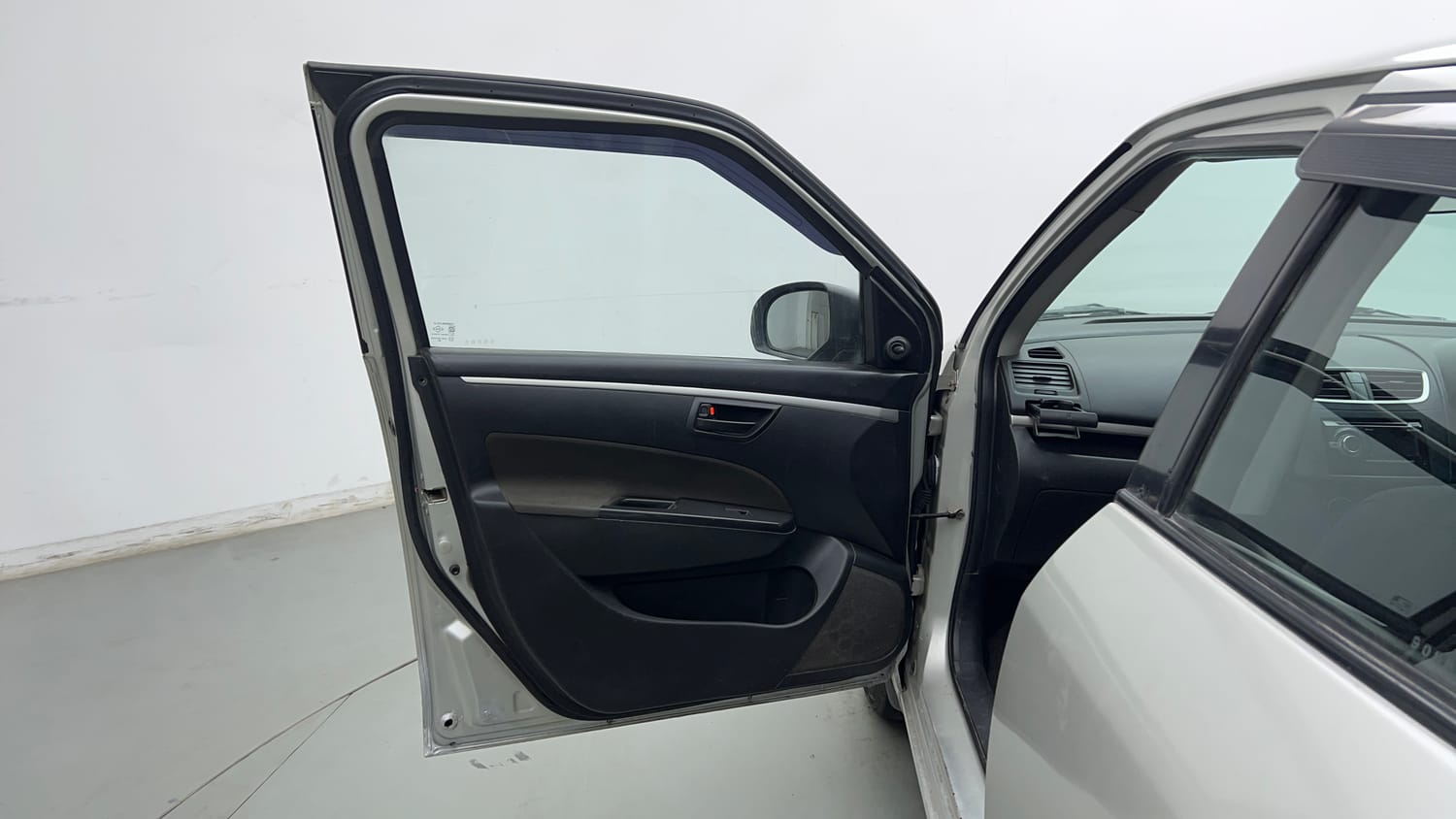 Used 2017 Maruti Suzuki Swift LXi (O) Petrol Manual interior LEFT FRONT DOOR OPEN VIEW