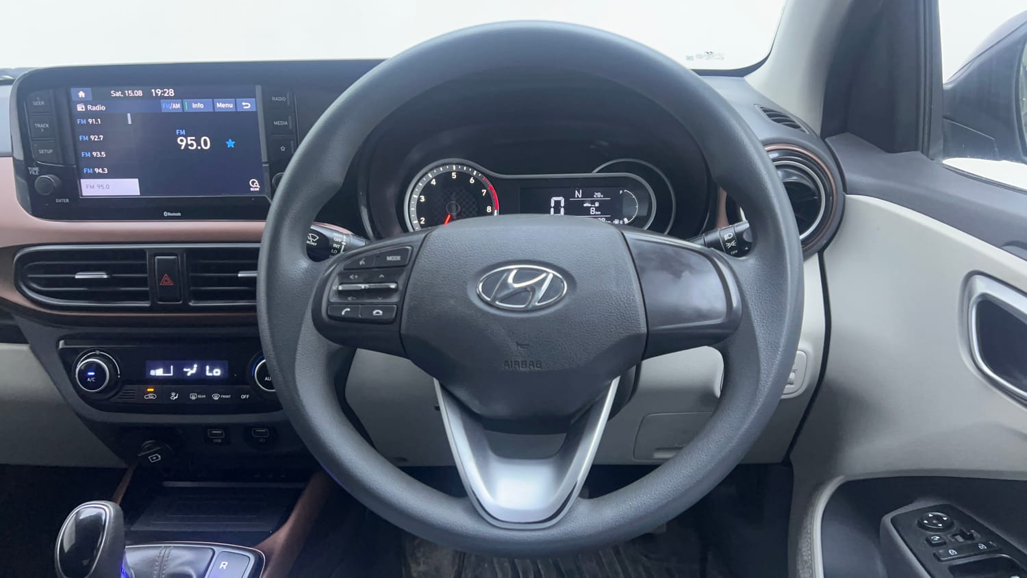 Used 2022 Hyundai Aura SX Plus 1.2 AMT Petrol Petrol Automatic interior STEERING VIEW