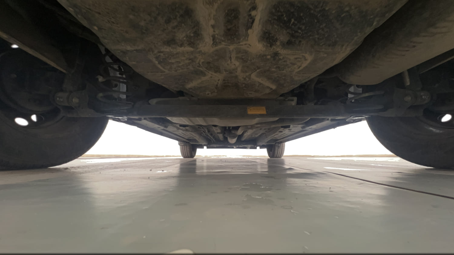 Used 2023 Tata Punch Adventure Rhythm Pack MT Petrol Manual extra REAR UNDERBODY VIEW (TAKEN FROM REAR)