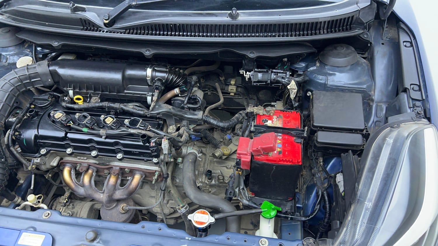 Used 2021 Maruti Suzuki Baleno Zeta Petrol Manual engine ENGINE LEFT SIDE VIEW