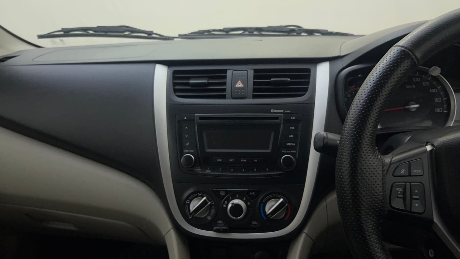 Used 2017 Maruti Suzuki Celerio ZXi Petrol Manual top_features Integrated (in-dash) music system