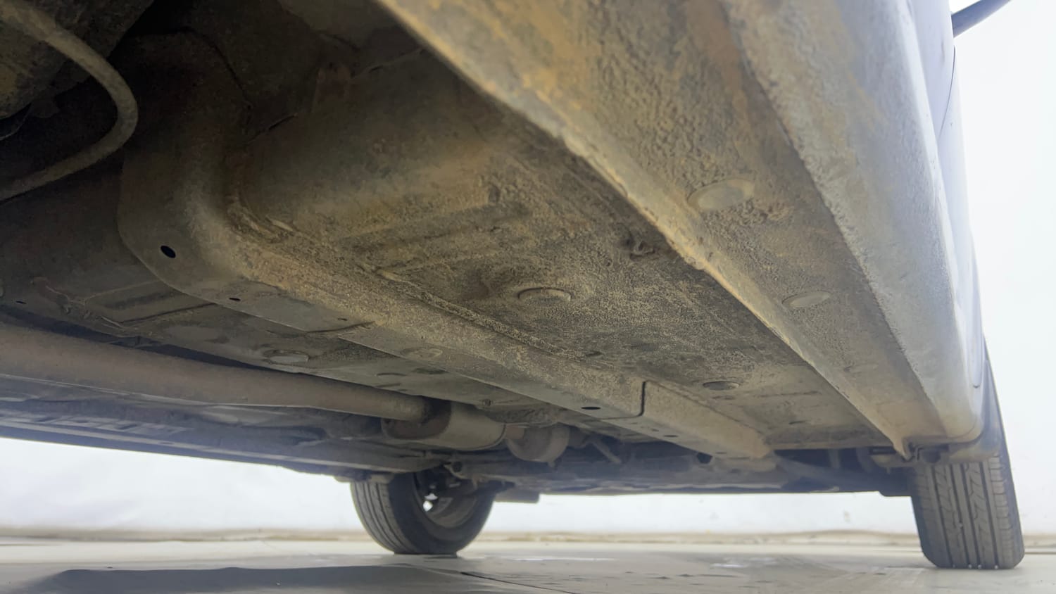 Used 2022 Hyundai Aura SX Plus 1.2 AMT Petrol Petrol Automatic extra REAR RIGHT UNDERBODY VIEW