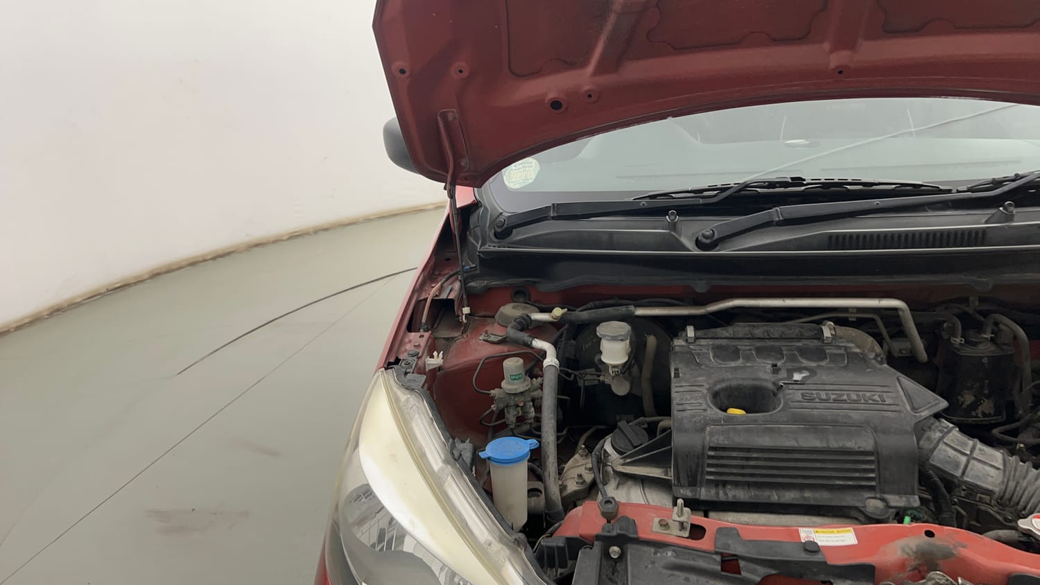 Used 2015 Maruti Suzuki Celerio VXi AMT Petrol Automatic engine ENGINE RIGHT SIDE HINGE & APRON VIEW