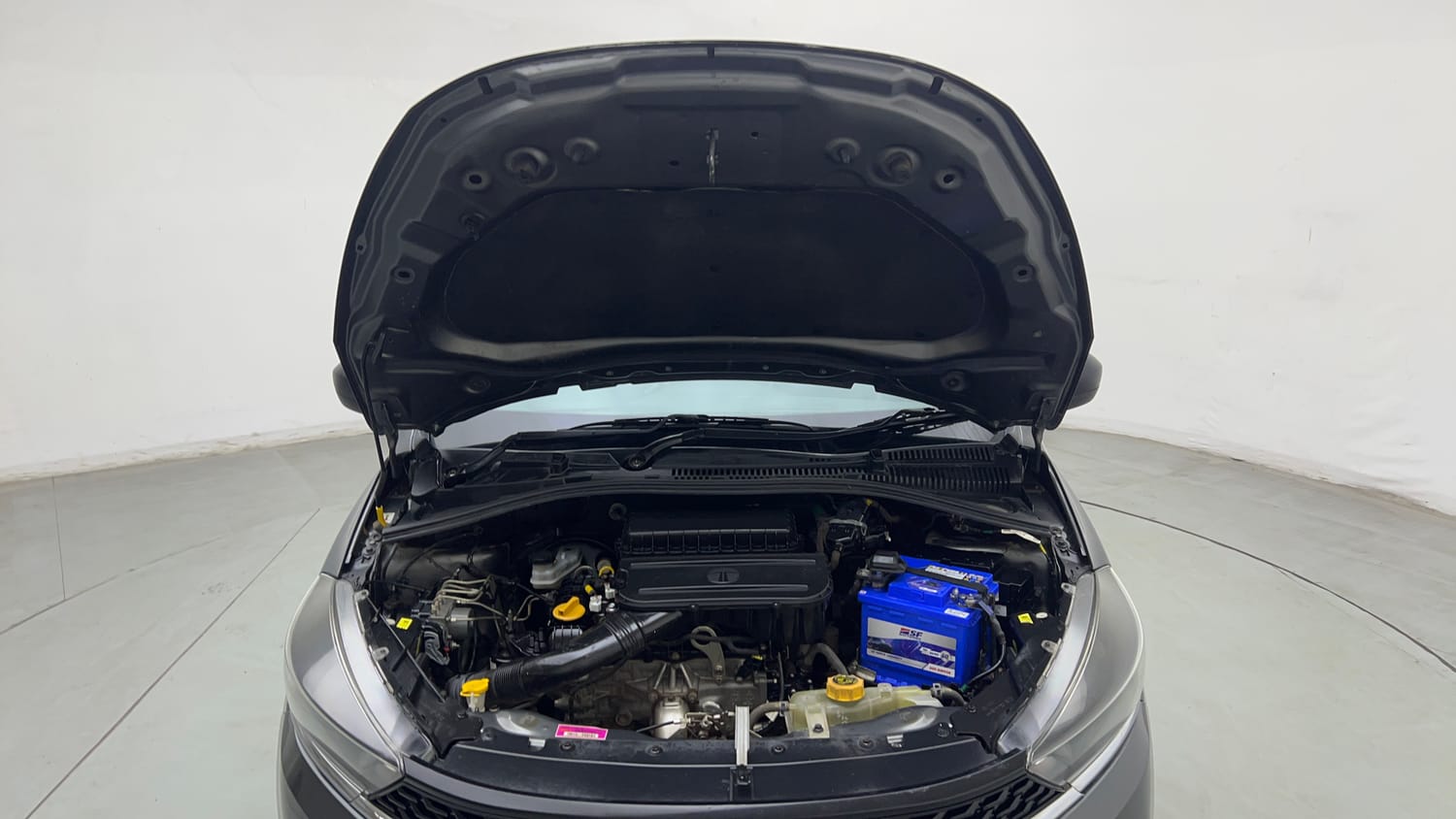 Used 2022 Tata Tiago XE Petrol Manual engine ENGINE & BONNET OPEN FRONT VIEW