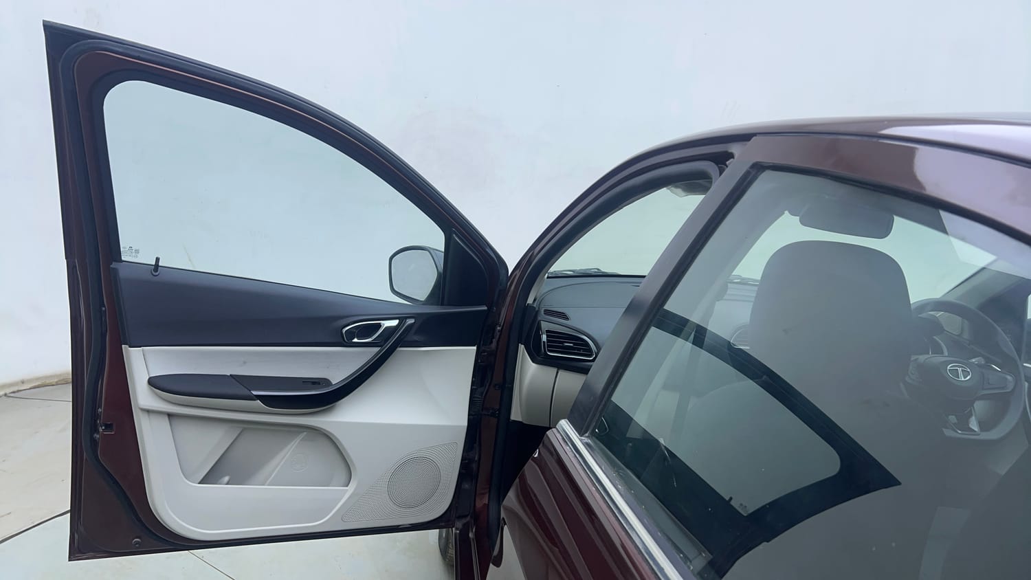 Used 2022 Tata Tigor XZA Plus Dual Tone Petrol Automatic interior LEFT FRONT DOOR OPEN VIEW