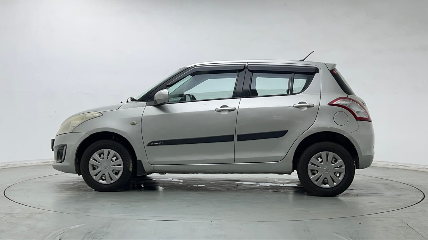 Used 2017 Maruti Suzuki Swift LXi (O) Petrol Manual exterior LEFT SIDE VIEW