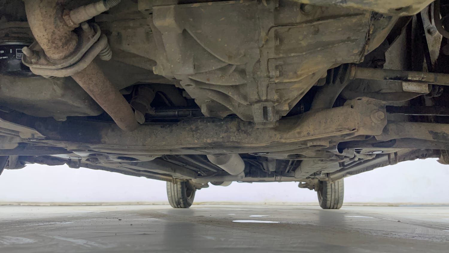 Used 2014 Maruti Suzuki Ertiga Vxi Petrol Manual extra FRONT LEFT UNDERBODY VIEW