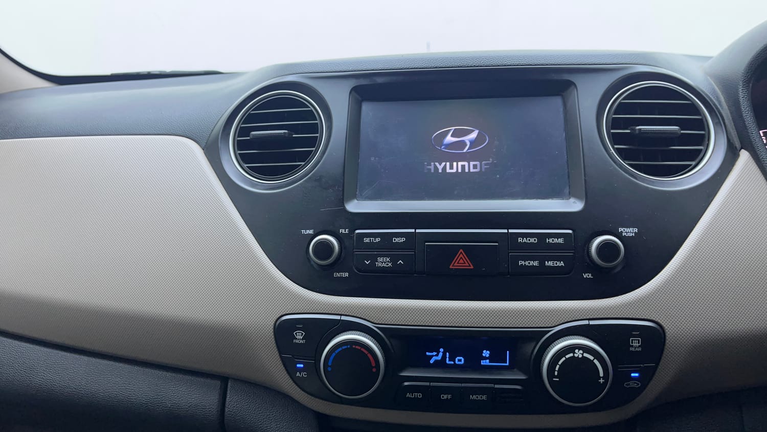 Used 2017 Hyundai Grand i10 Asta 1.2 Kappa VTVT Petrol Manual interior MUSIC SYSTEM & AC CONTROL VIEW