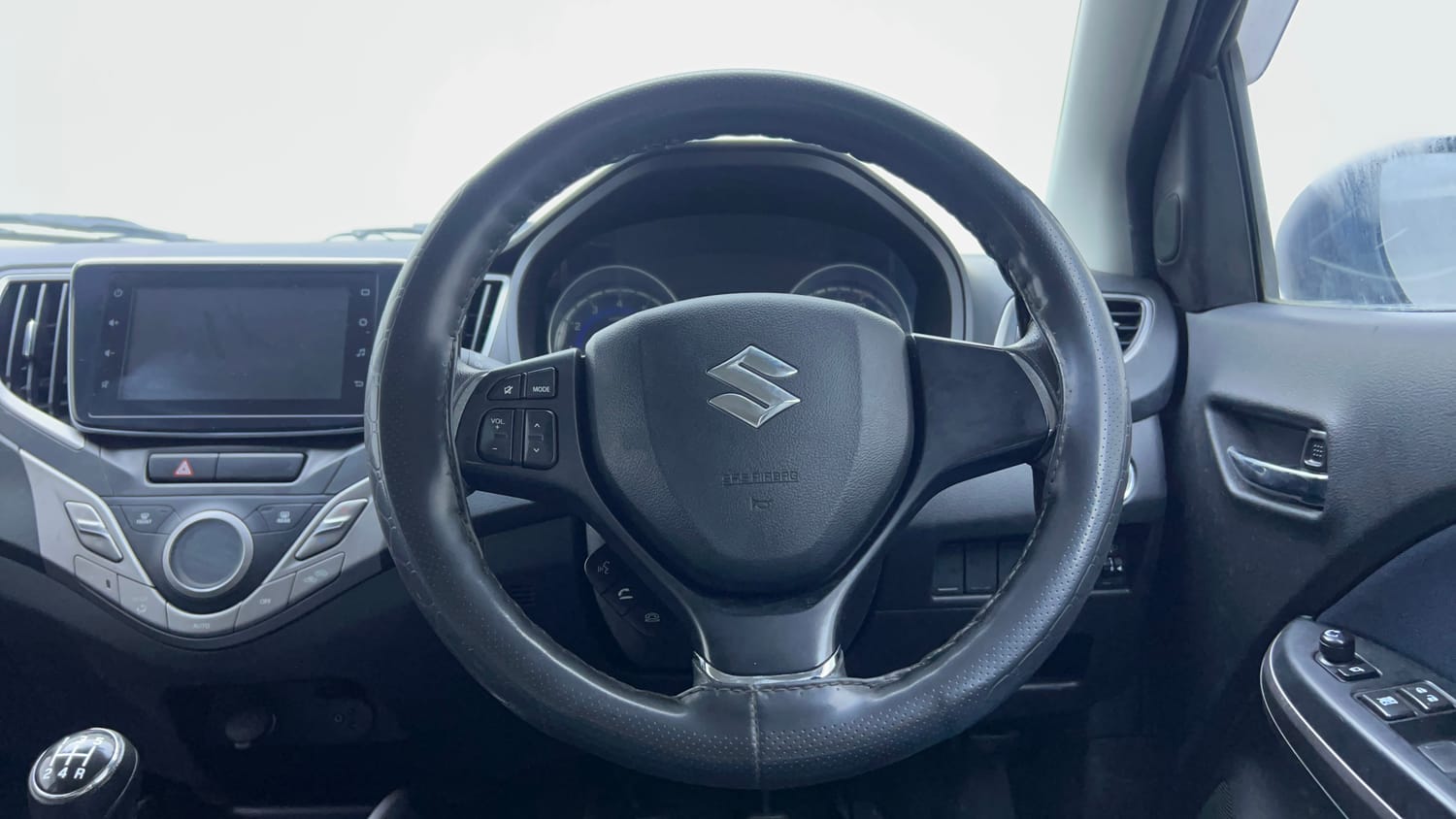 Used 2021 Maruti Suzuki Baleno Zeta Petrol Manual interior STEERING VIEW