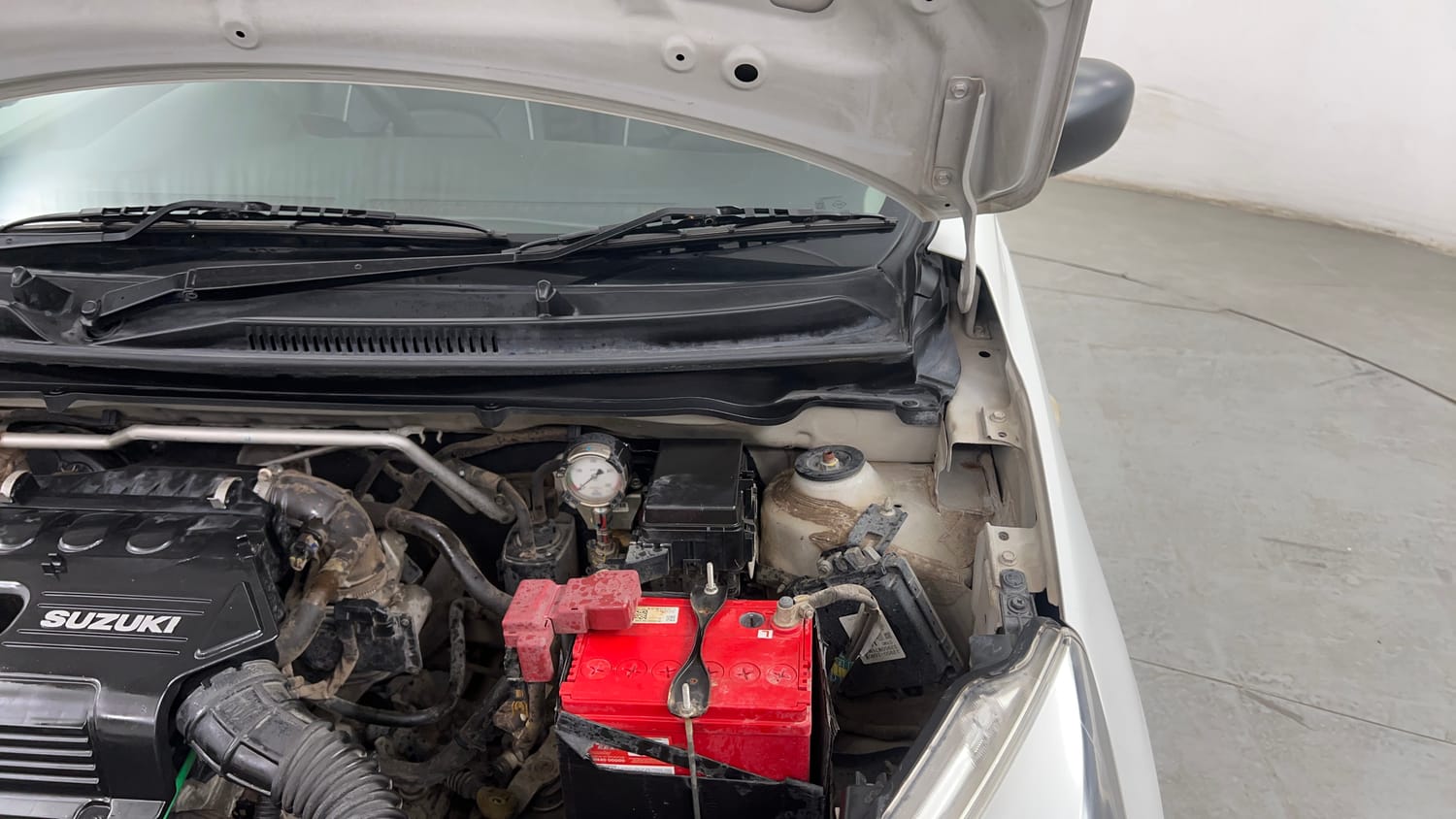 Used 2016 Maruti Suzuki Celerio VXi CNG Cng Manual engine ENGINE LEFT SIDE HINGE & APRON VIEW