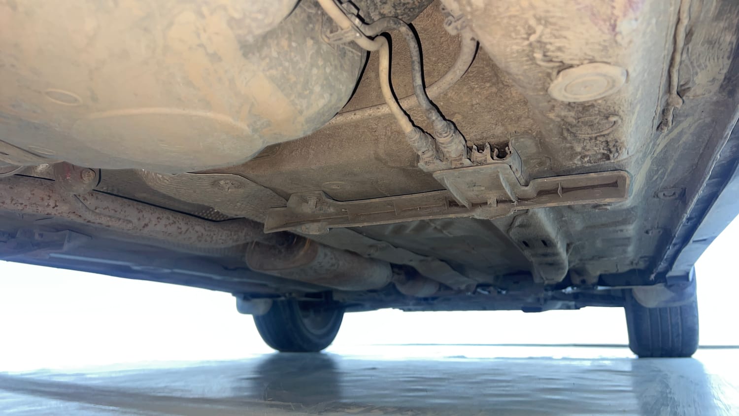 Used 2022 Volkswagen Taigun Topline 1.0 TSI AT Petrol Automatic extra REAR RIGHT UNDERBODY VIEW
