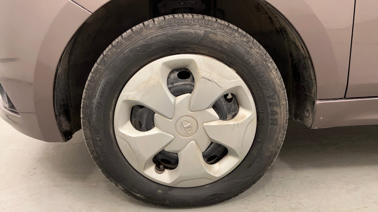 Used 2016 Tata Tiago Revotron XT Petrol Manual tyres LEFT FRONT TYRE RIM VIEW
