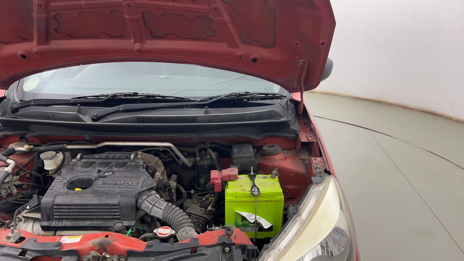 Used 2015 Maruti Suzuki Celerio VXi AMT Petrol Automatic engine ENGINE LEFT SIDE HINGE & APRON VIEW