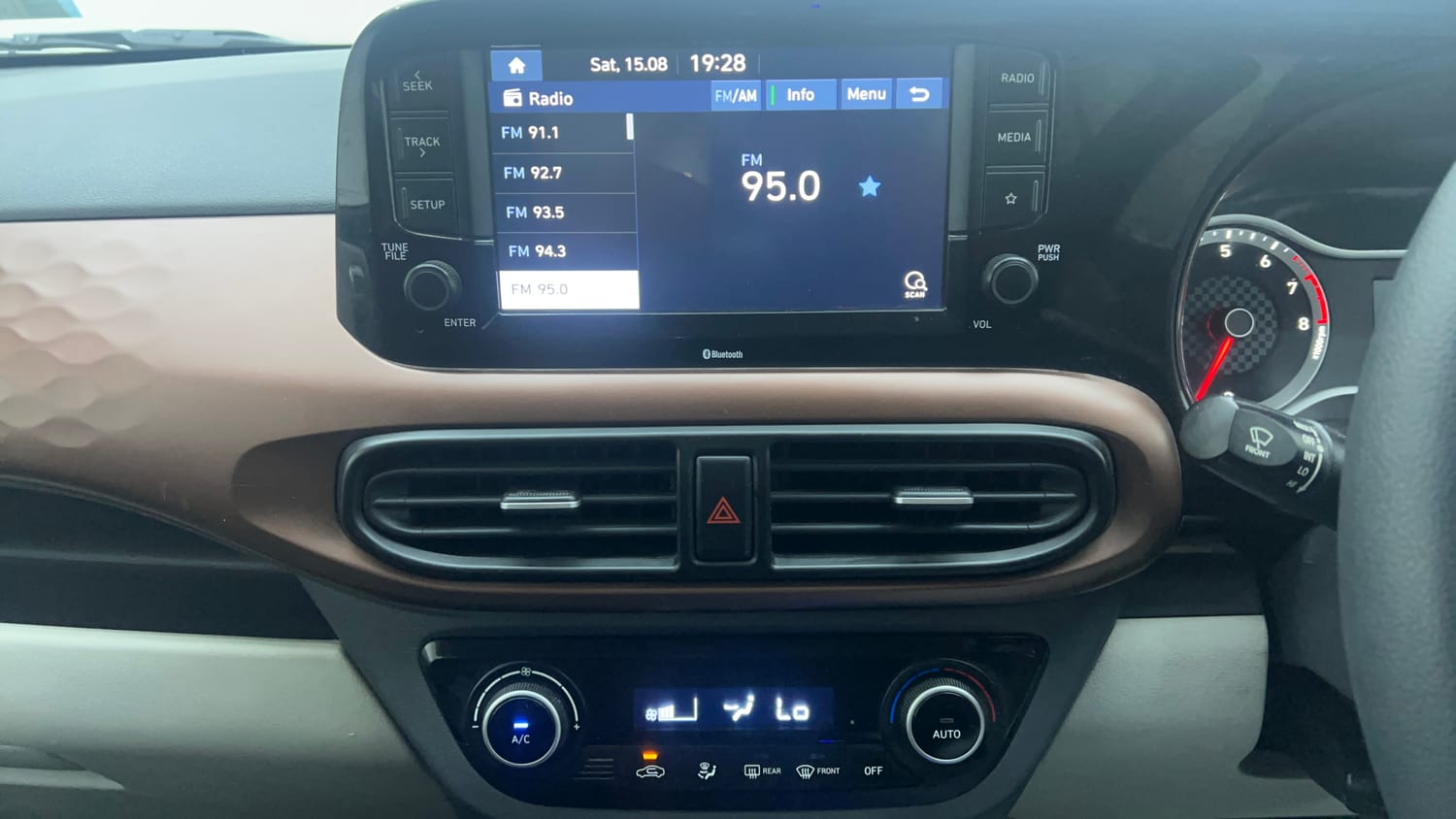 Used 2022 Hyundai Aura SX Plus 1.2 AMT Petrol Petrol Automatic interior MUSIC SYSTEM & AC CONTROL VIEW