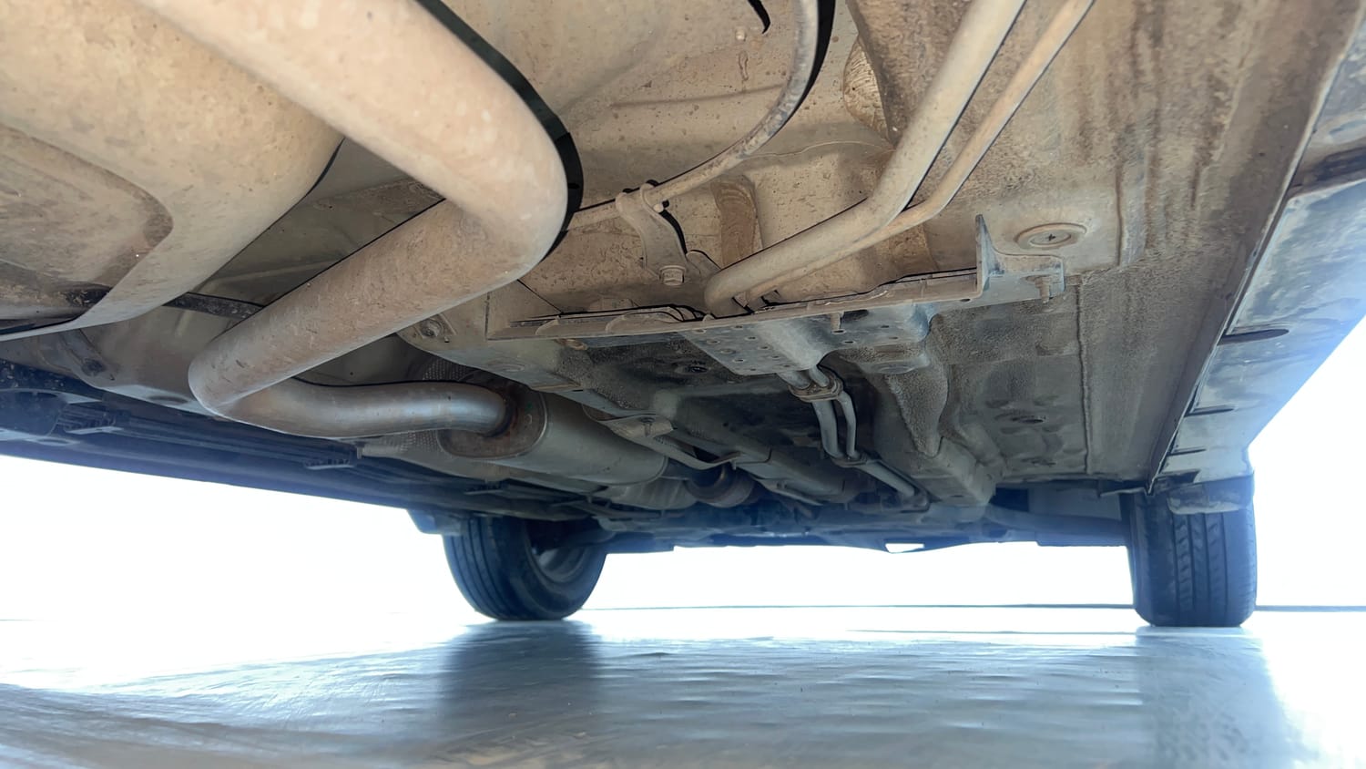 Used 2022 Kia Carens Prestige Plus 1.4 Petrol MT 7 STR Petrol Manual extra REAR RIGHT UNDERBODY VIEW