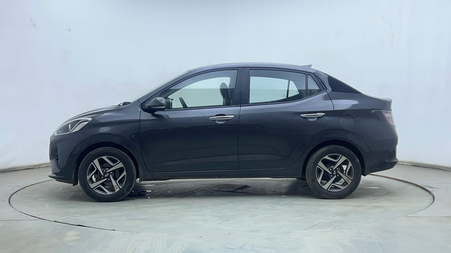 Used 2022 Hyundai Aura SX Plus 1.2 AMT Petrol Petrol Automatic exterior LEFT SIDE VIEW