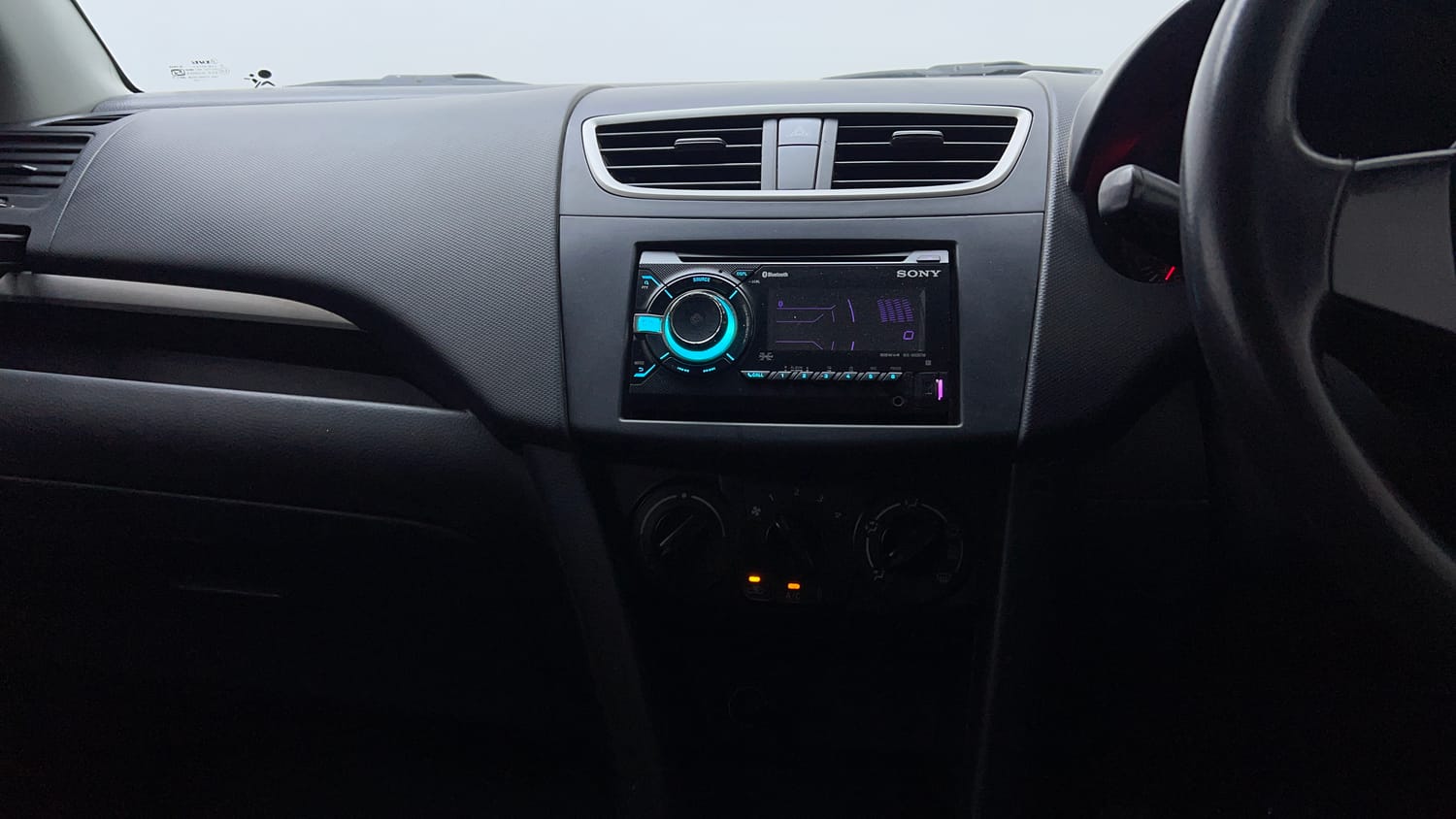Used 2017 Maruti Suzuki Swift LXi (O) Petrol Manual interior MUSIC SYSTEM & AC CONTROL VIEW