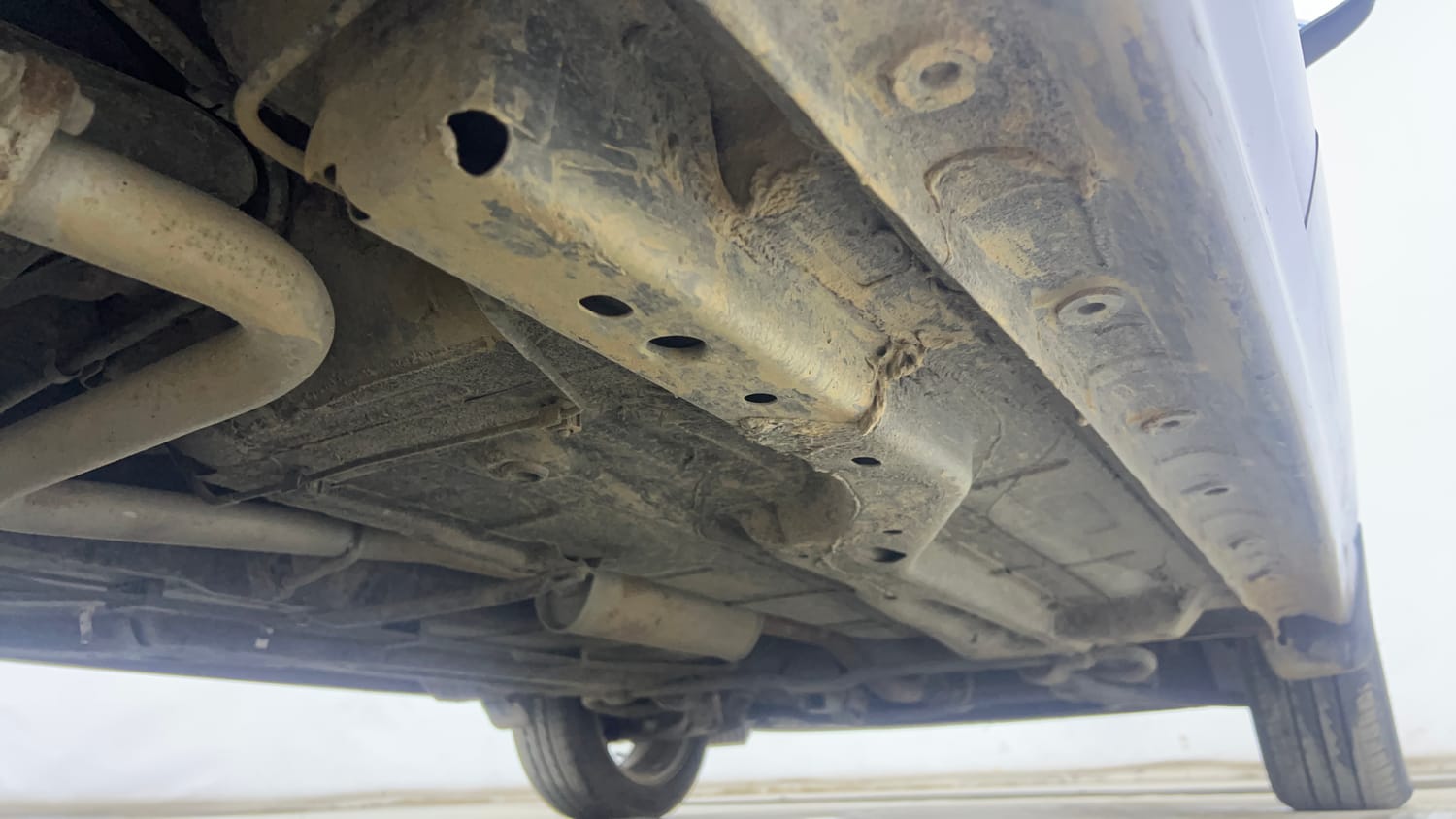 Used 2022 Tata Tigor XZA Plus Dual Tone Petrol Automatic extra REAR RIGHT UNDERBODY VIEW