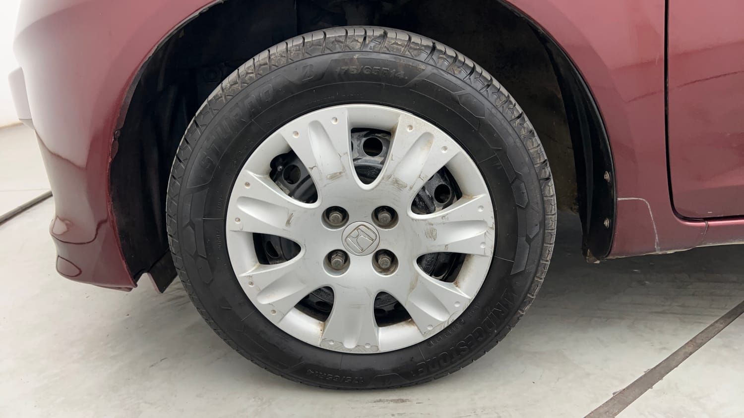 Used 2015 Honda Amaze 1.2 S i-VTEC Petrol Manual tyres LEFT FRONT TYRE RIM VIEW