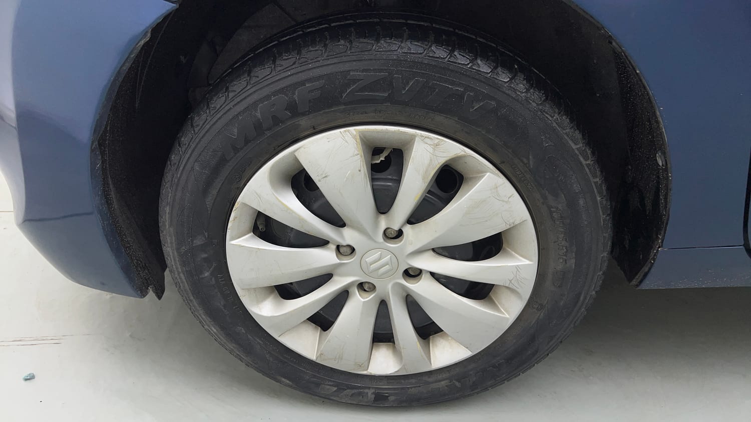Used 2017 Maruti Suzuki Baleno Delta 1.2 Petrol Manual tyres LEFT FRONT TYRE RIM VIEW