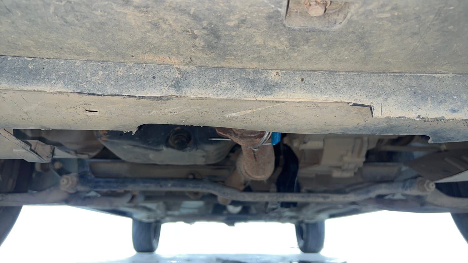 Used 2022 Tata Tiago XE Petrol Manual extra FRONT LEFT UNDERBODY VIEW