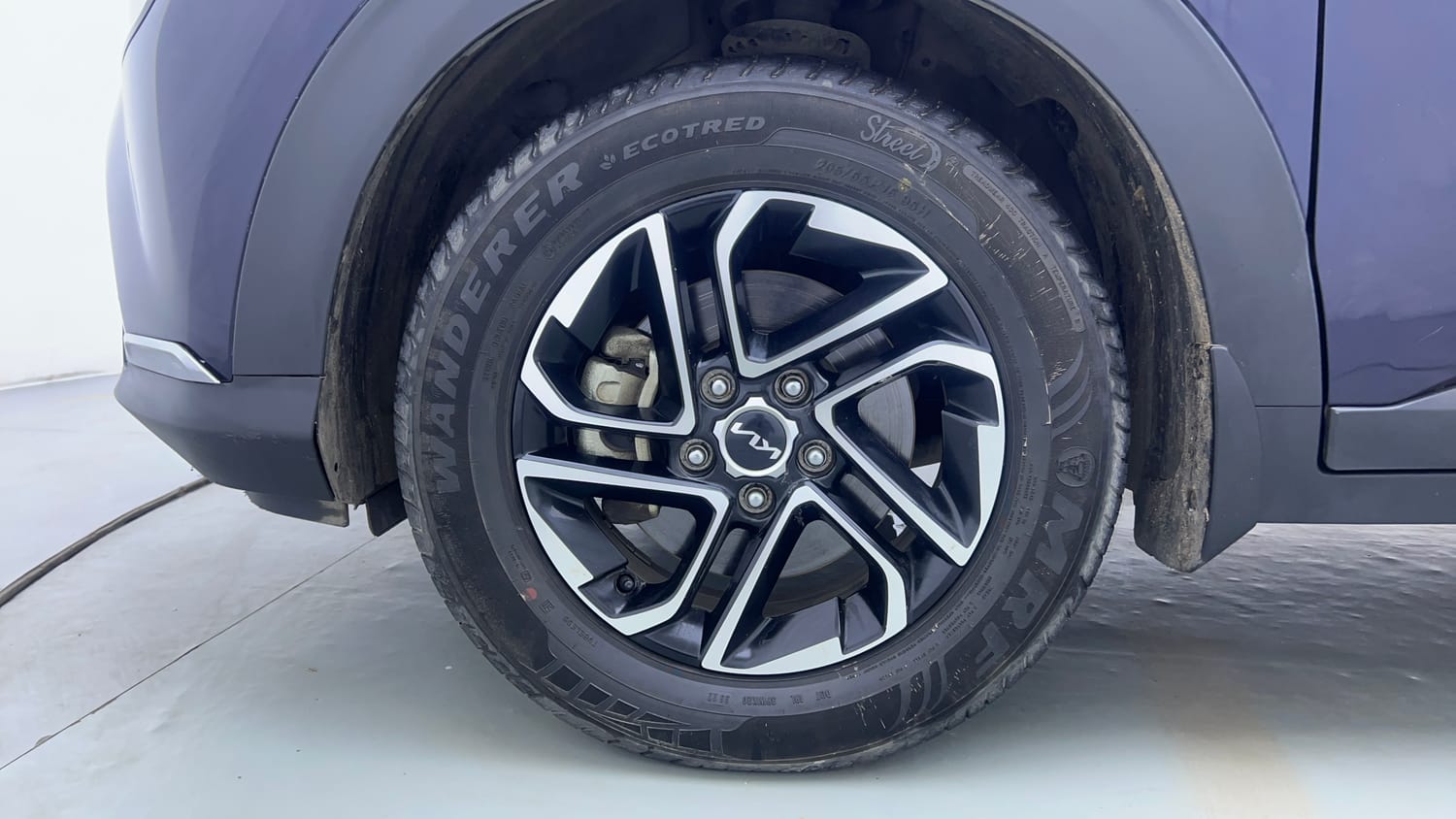 Used 2022 Kia Carens Prestige Plus 1.4 Petrol MT 7 STR Petrol Manual tyres LEFT FRONT TYRE RIM VIEW