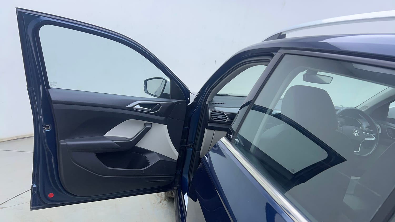 Used 2025 Volkswagen Taigun Topline 1.0 TSI AT Petrol Automatic interior LEFT FRONT DOOR OPEN VIEW