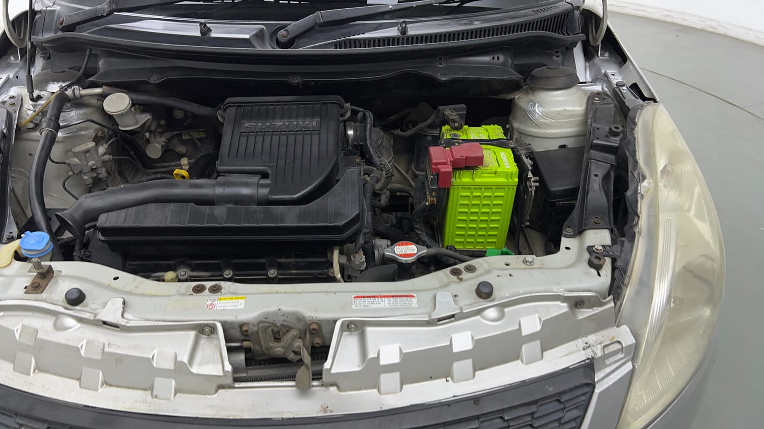 Used 2017 Maruti Suzuki Swift LXi (O) Petrol Manual engine ENGINE LEFT SIDE VIEW