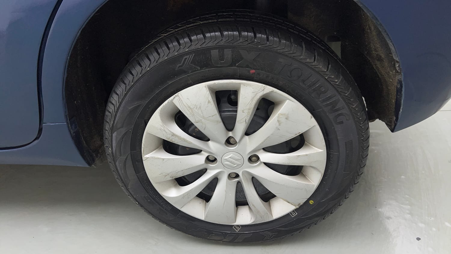 Used 2017 Maruti Suzuki Baleno Delta 1.2 Petrol Manual tyres LEFT REAR TYRE RIM VIEW