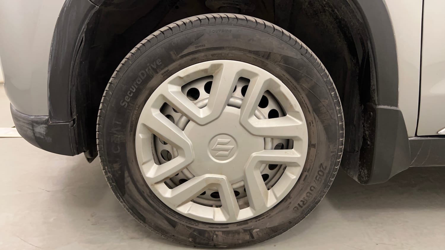 Used 2022 maruti-suzuki Vitara Brezza LXi Petrol Manual tyres LEFT FRONT TYRE RIM VIEW